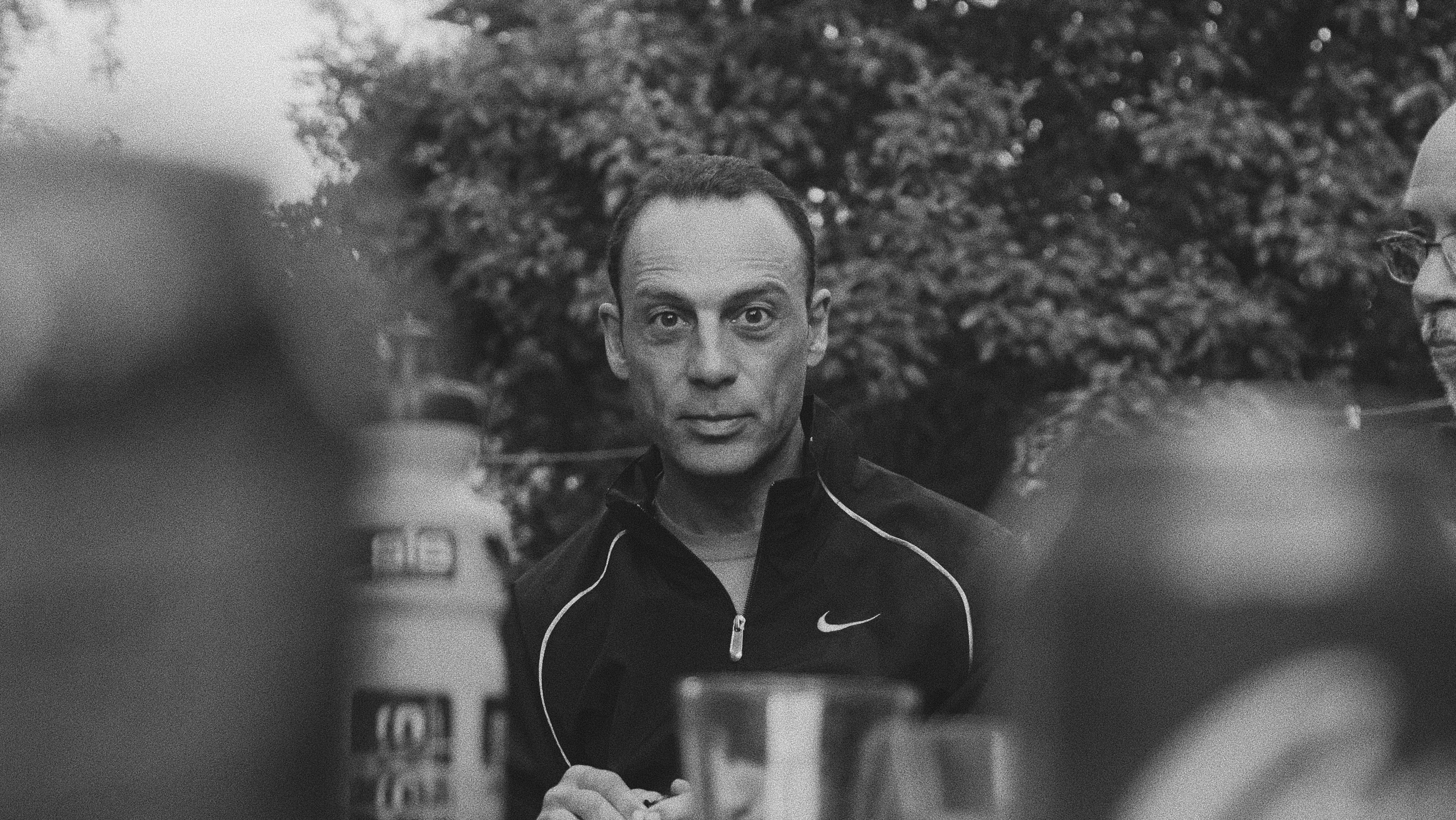 man wearing black Nike jacket