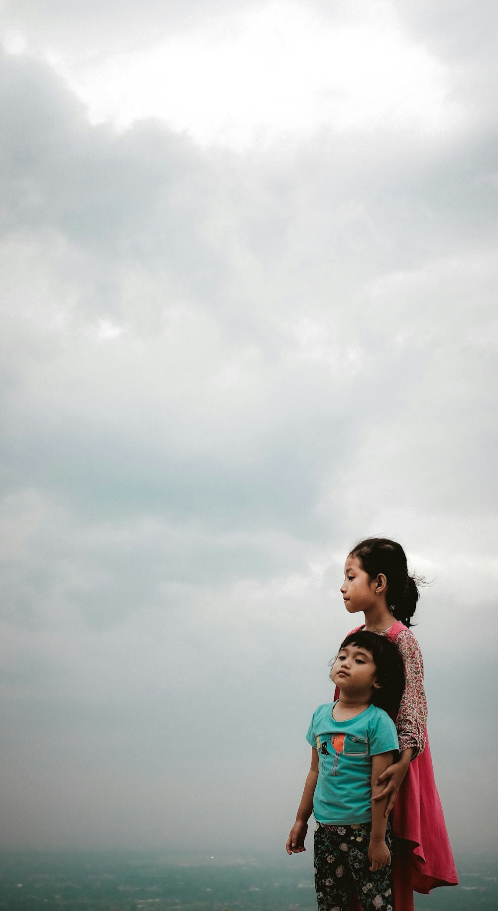 girl and boy standing