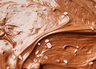 a close up of a chocolate frosted cake
