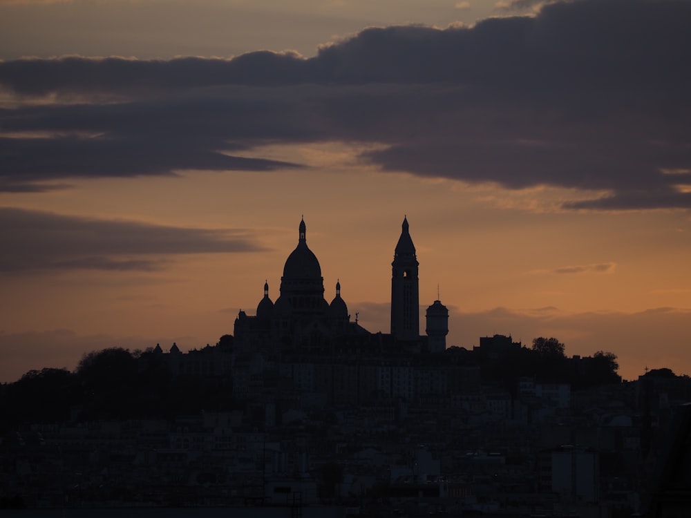 silhouette of building during golden hour