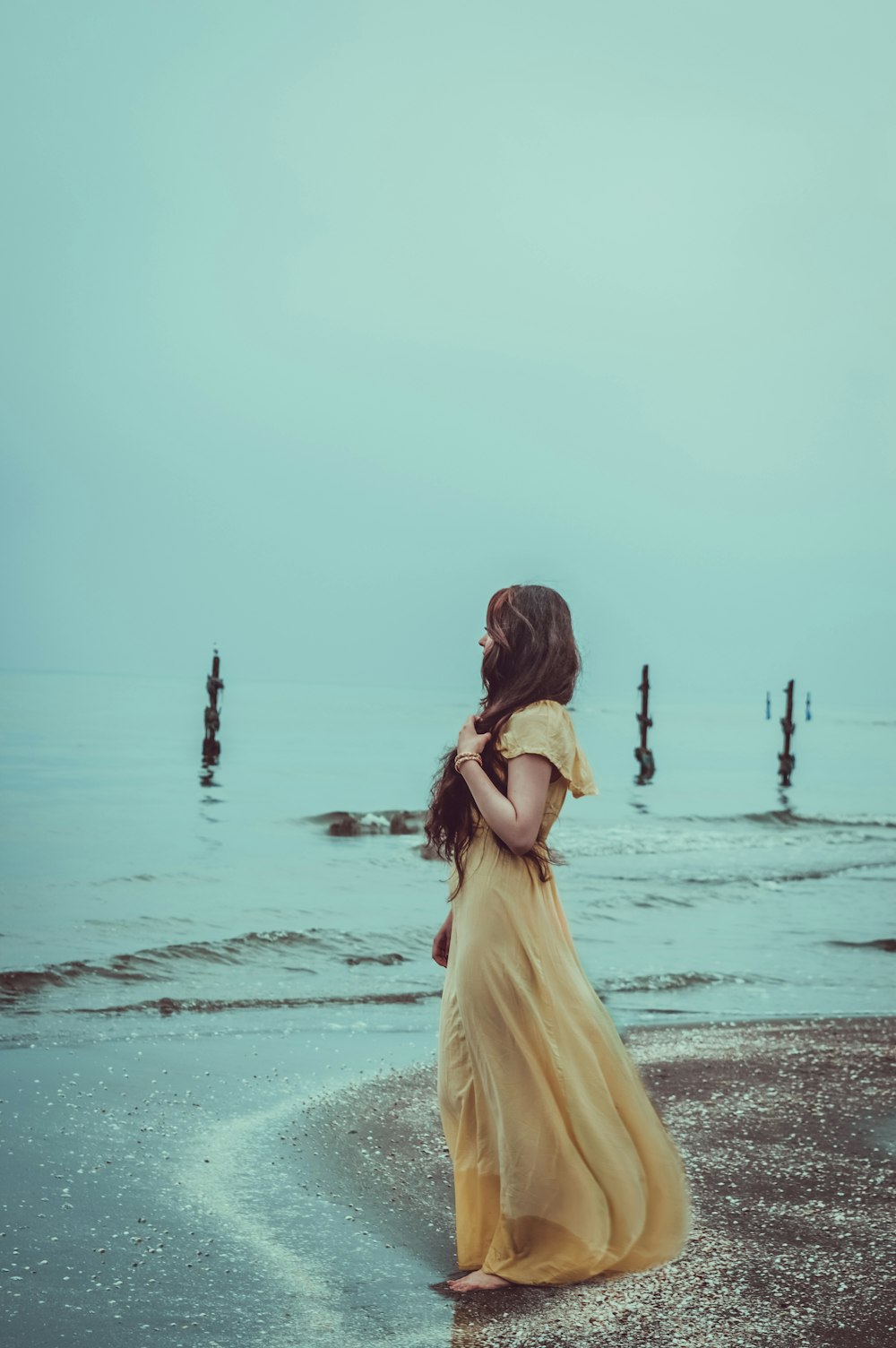 woman standing on shore