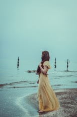 woman standing on shore