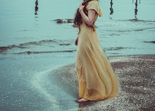 woman standing on shore