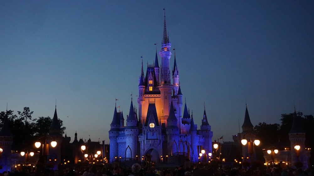 lighted white castle at night