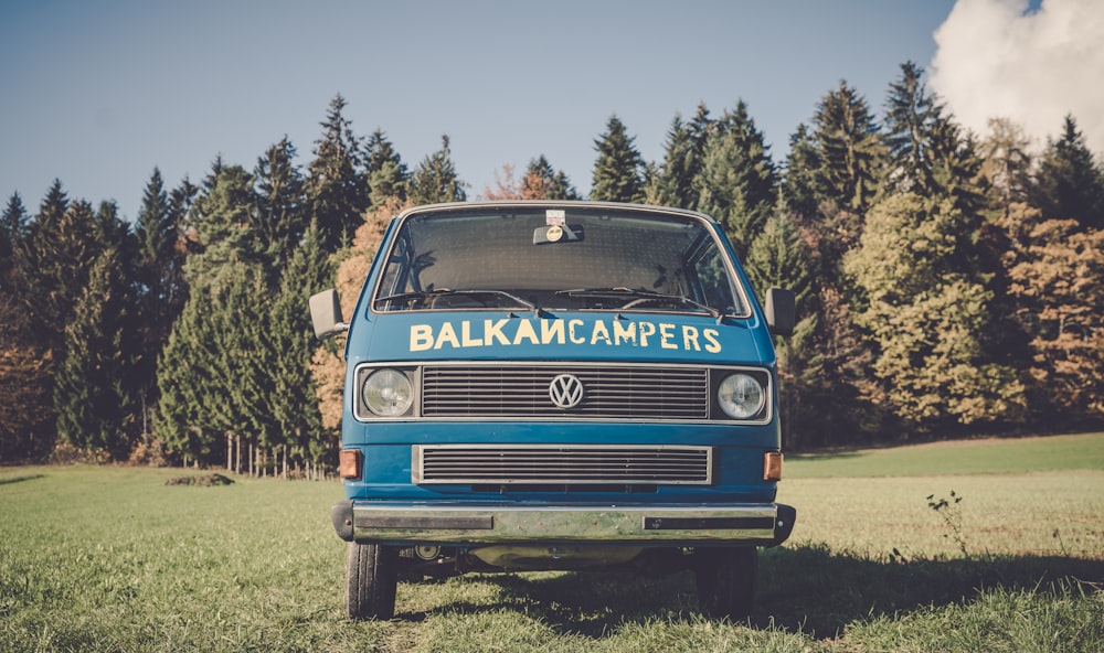 blue and white Volkswagen van