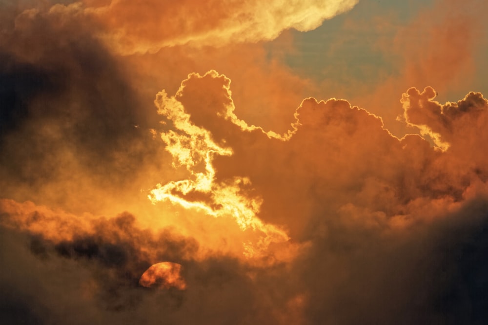 yellow clouds during golden hour