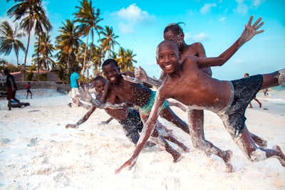 topless boys on beach kenya teams background