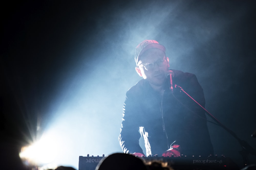 man playing electronic keyboard