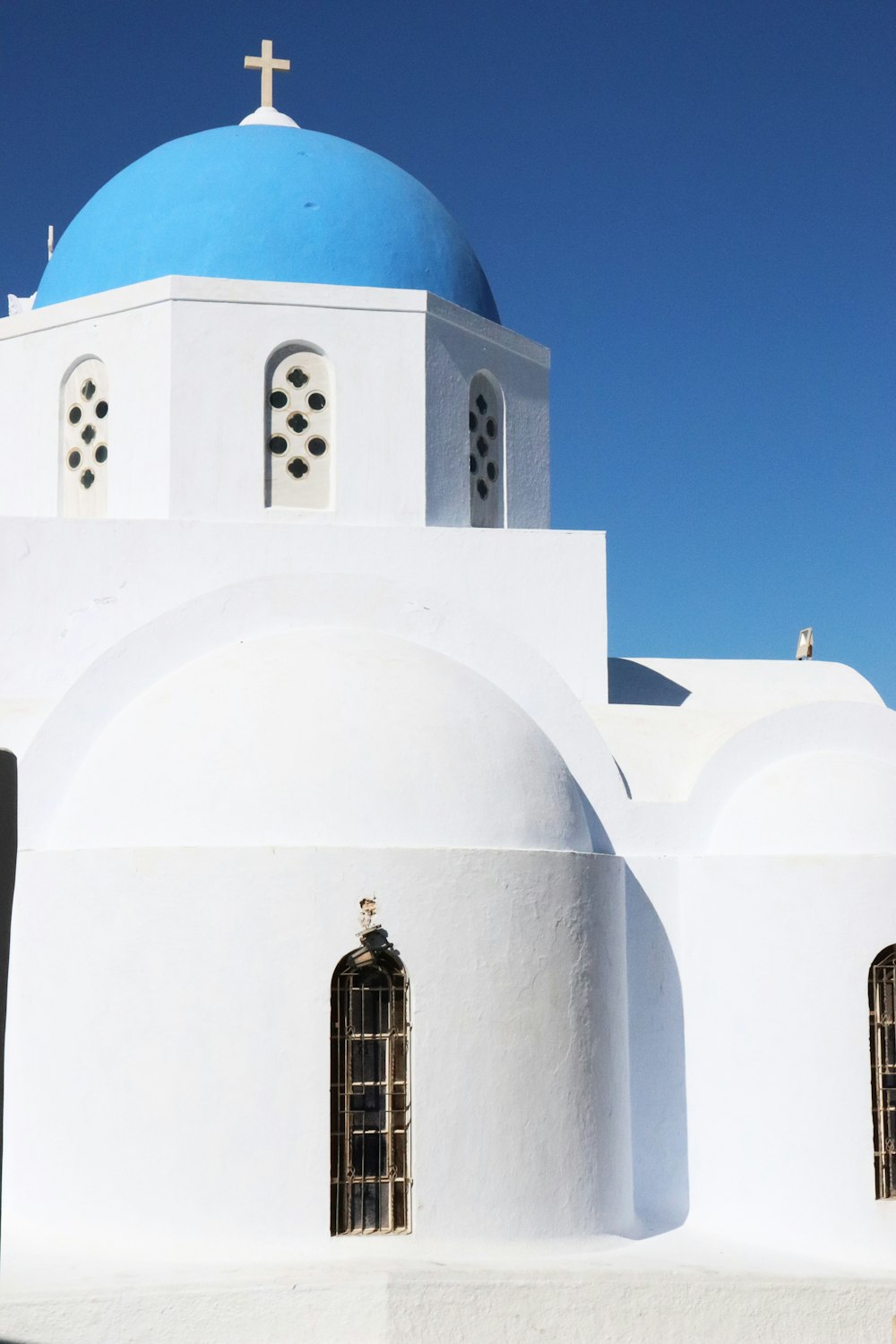 white and blue concrete church