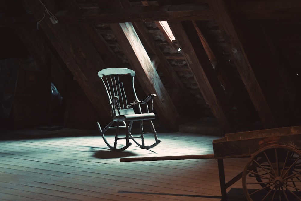 rocking chair on attic near window