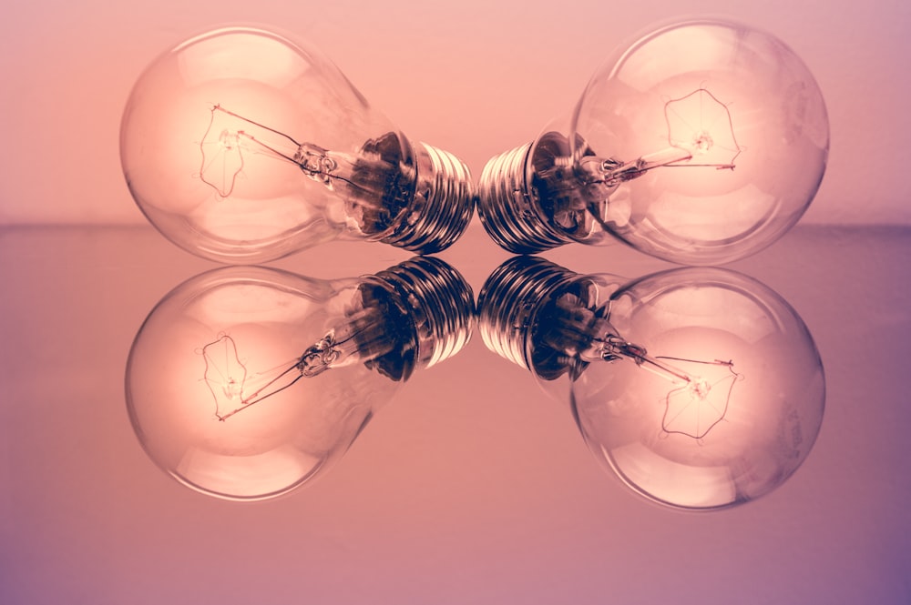 two clear light bulbs