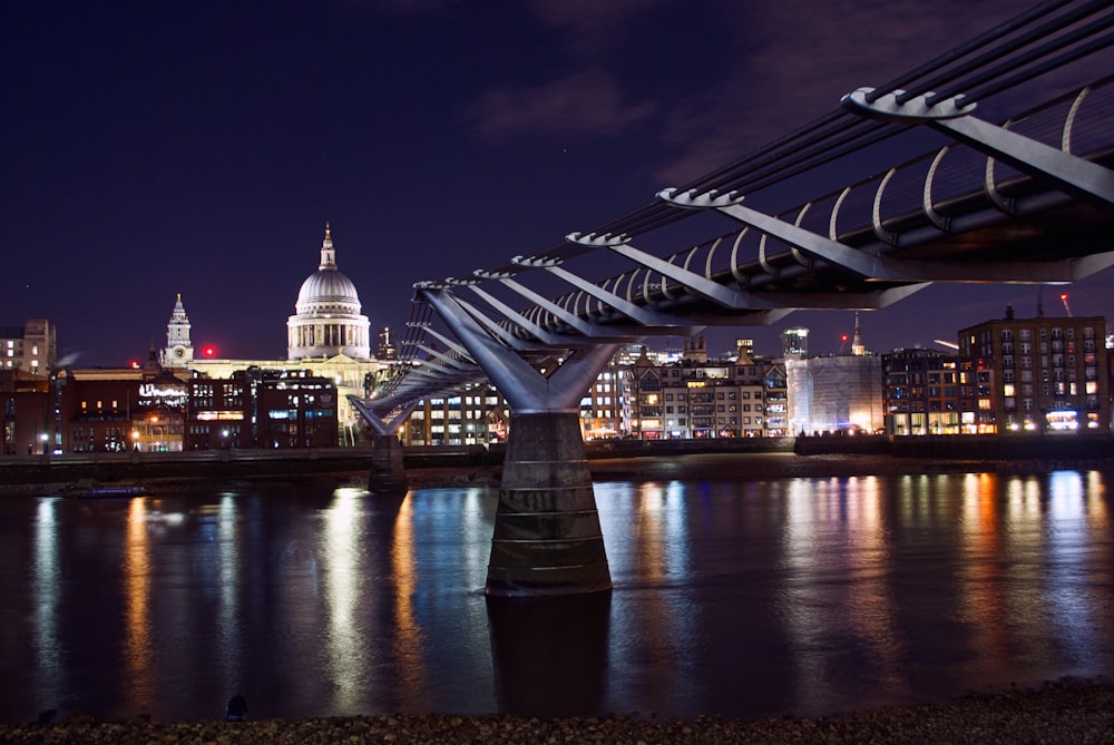 grey concrete bridge near building