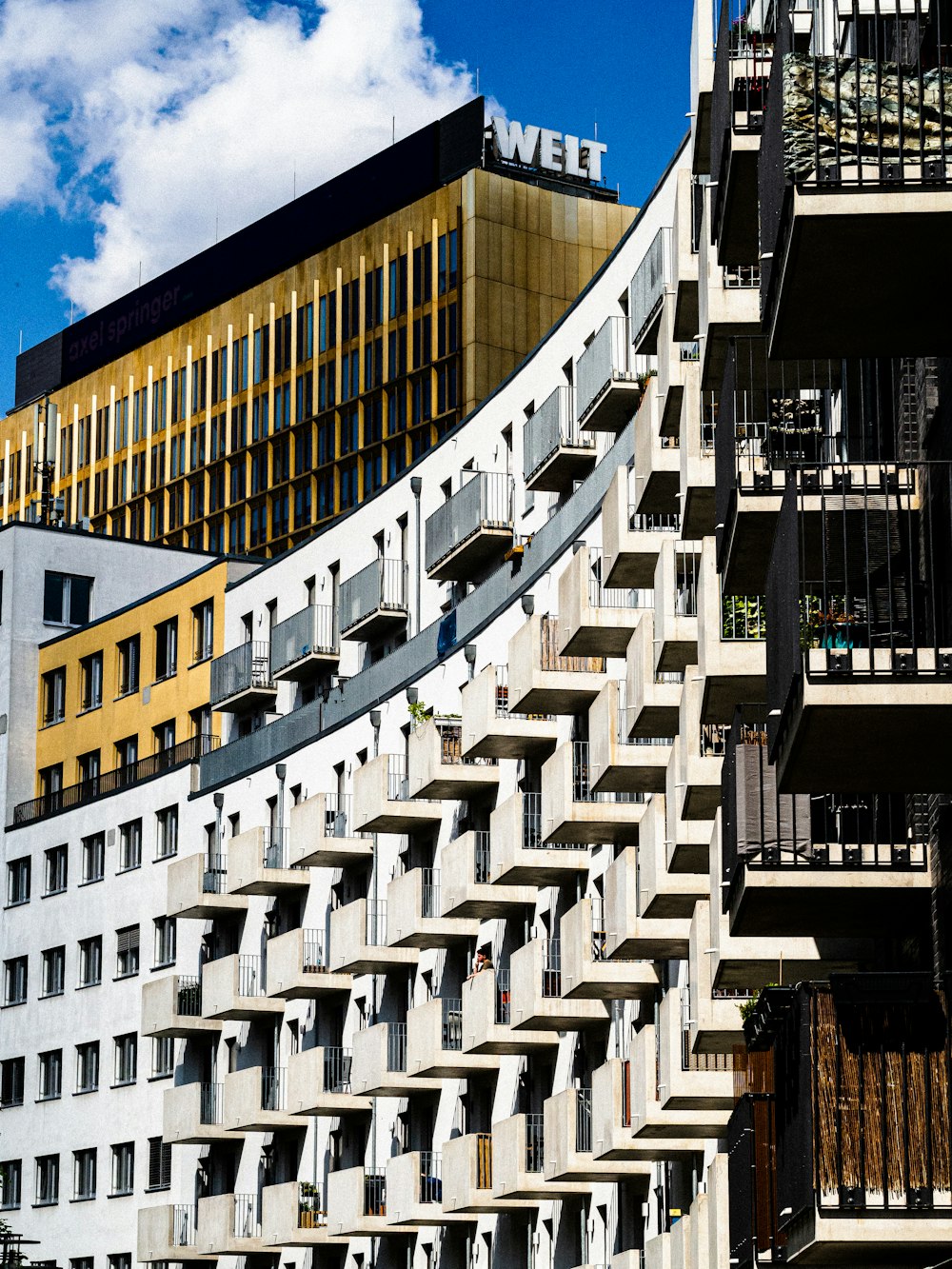 a building with balconies and balconies on the side of it