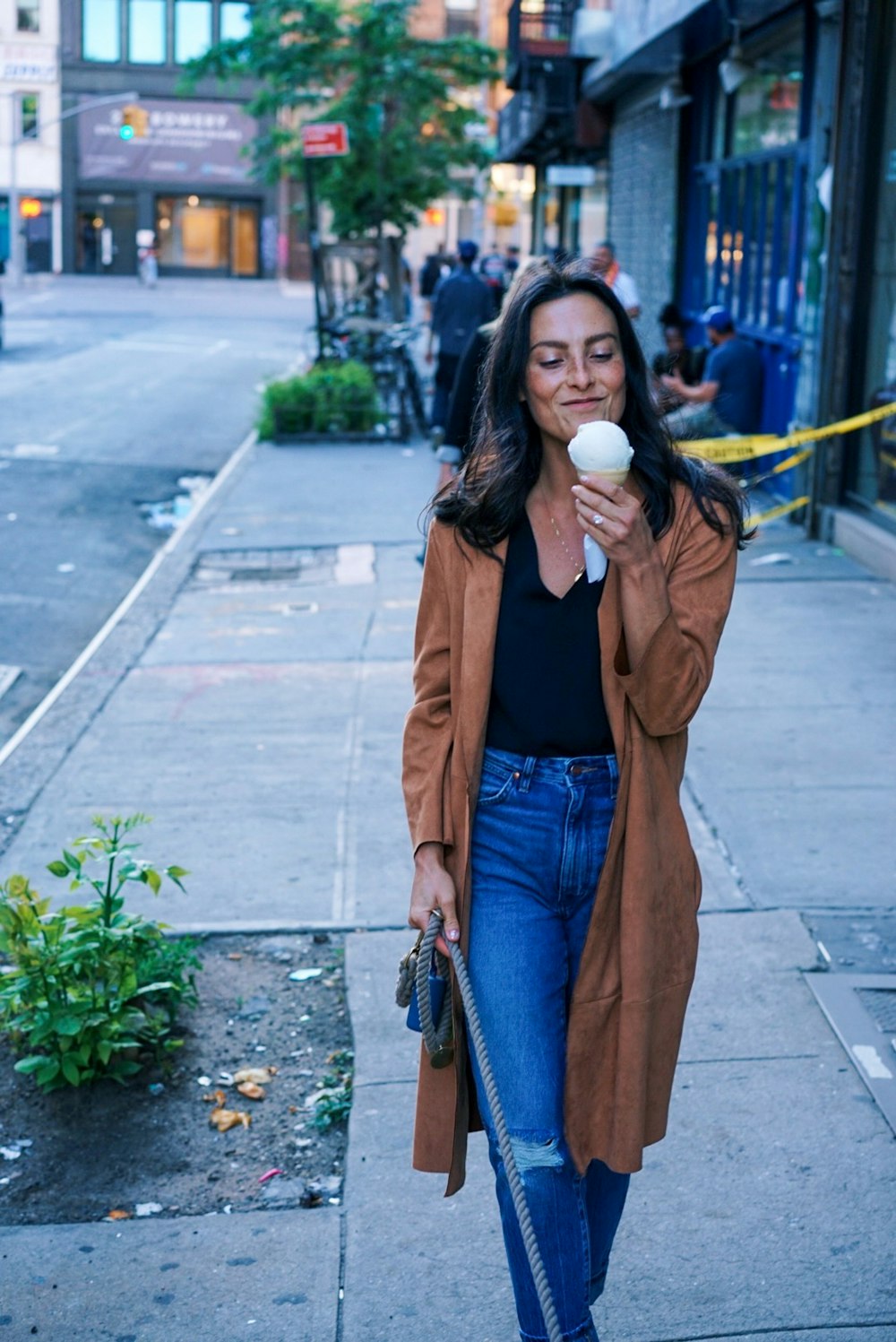 woman walking beside street