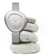 Elegant women's watch featuring a rose gold mesh band and minimalist face on a marble surface.