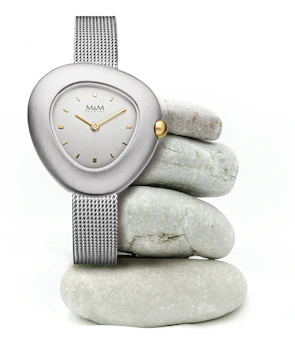 Elegant women's watch featuring a rose gold mesh band and minimalist face on a marble surface.