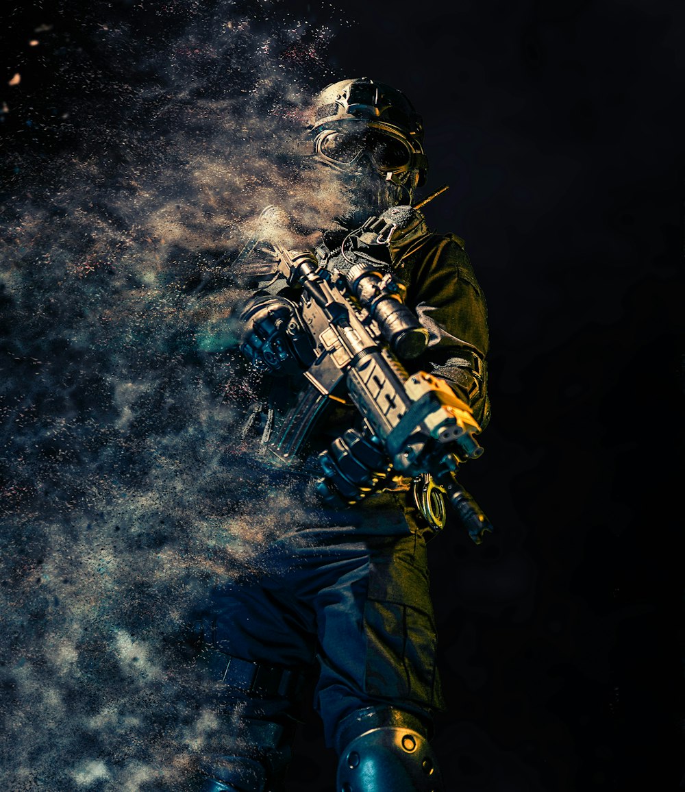 man holding rifle wallpaper