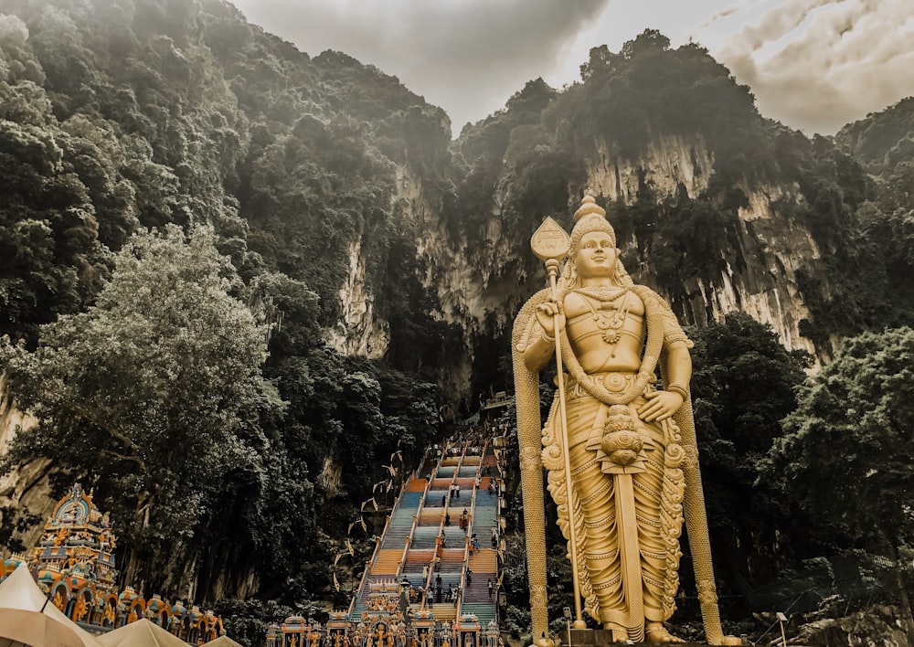 statue near mountain