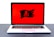 A laptop displaying a red screen with a black pirate flag symbol, featuring a skull and crossbones.