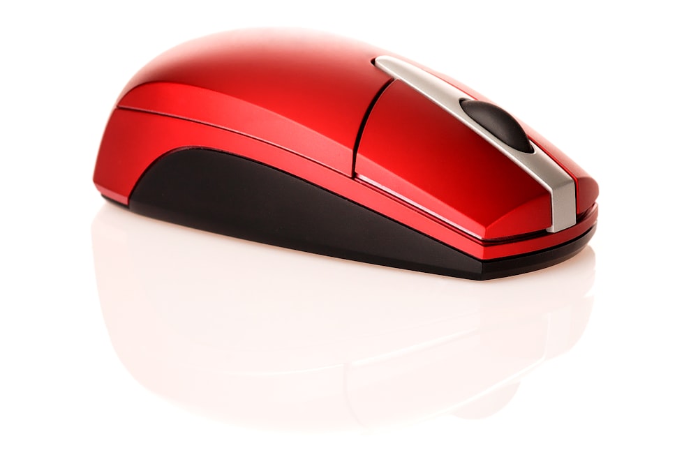 black and red wireless computer mouse