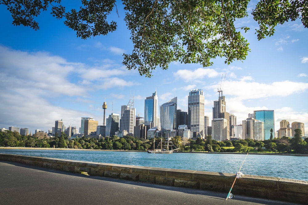 panoramic photo of high rise buildings near body of water during daytime