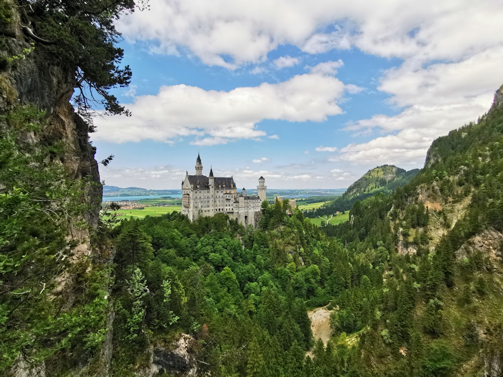 white and brown castle during cloudy day