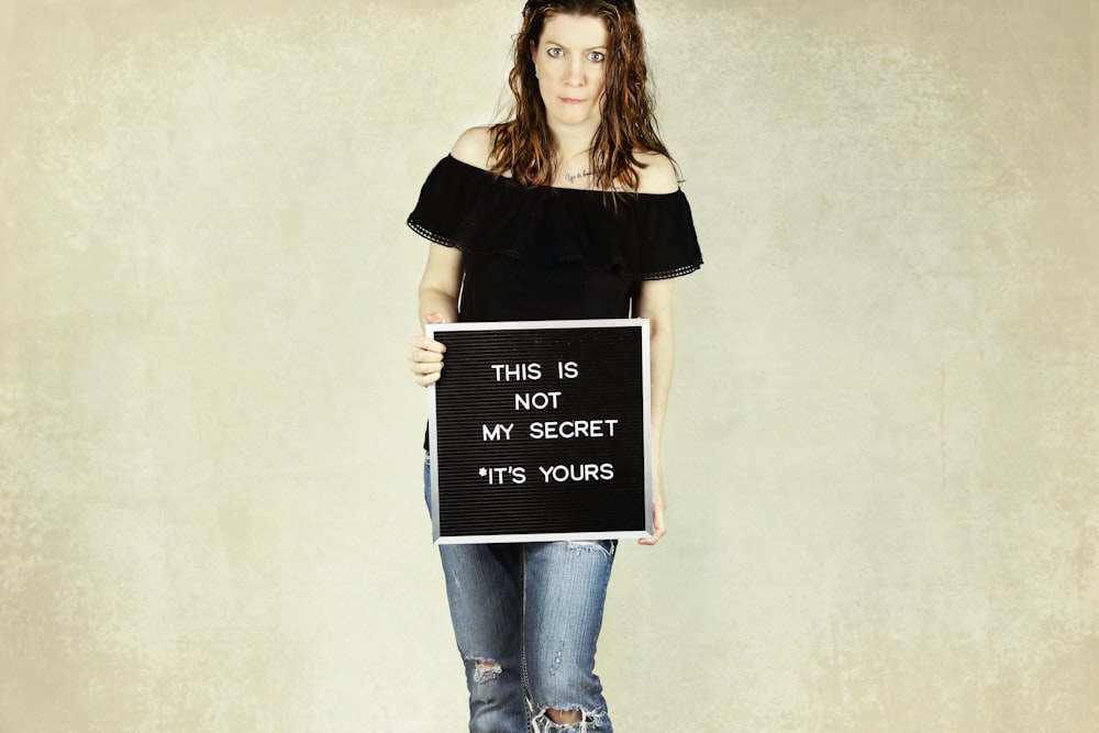 woman holding signage