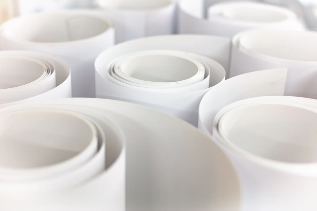 White offset paper reels at the Prodiconseil warehouse
