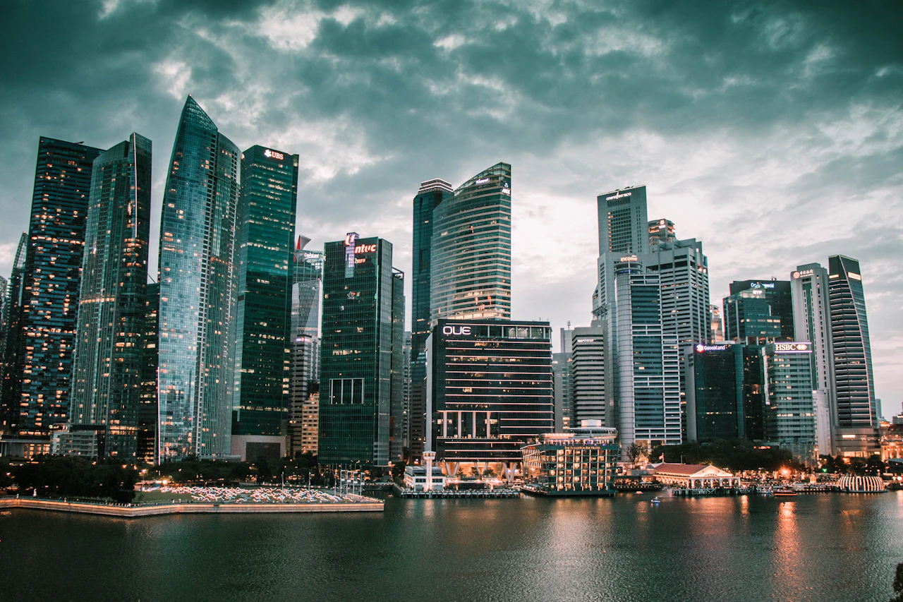 Towers of the Marina Bay financial district in Singapore at dusk