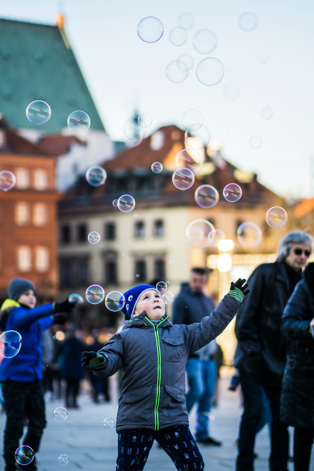 girl playing bubbles