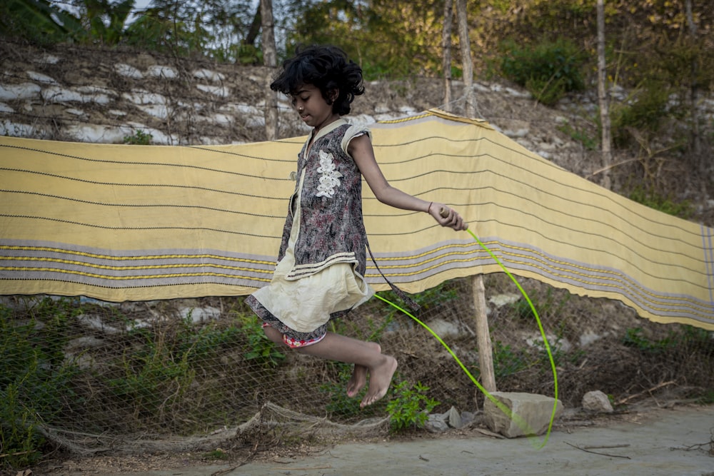 girl playing jump rope