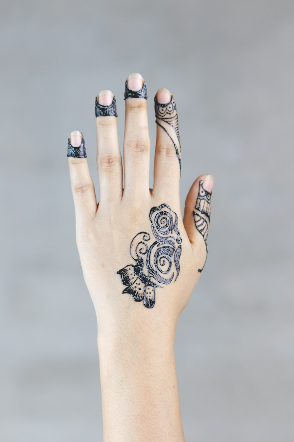 left person's hand with tattoo photo – Free Grey Image on Unsplash