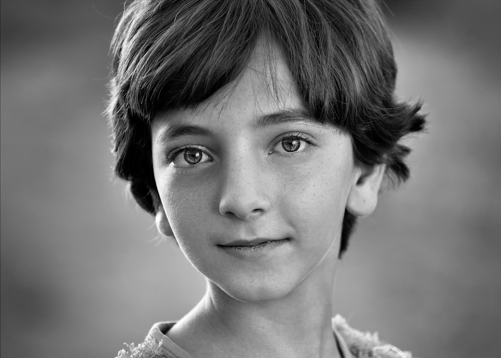 selective focus photography of boy during daytime