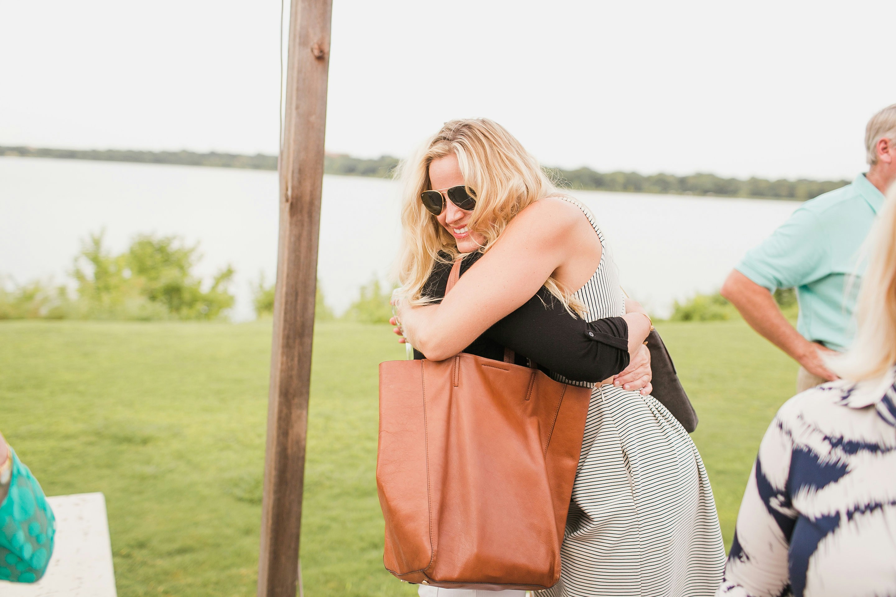 two women hugging each other