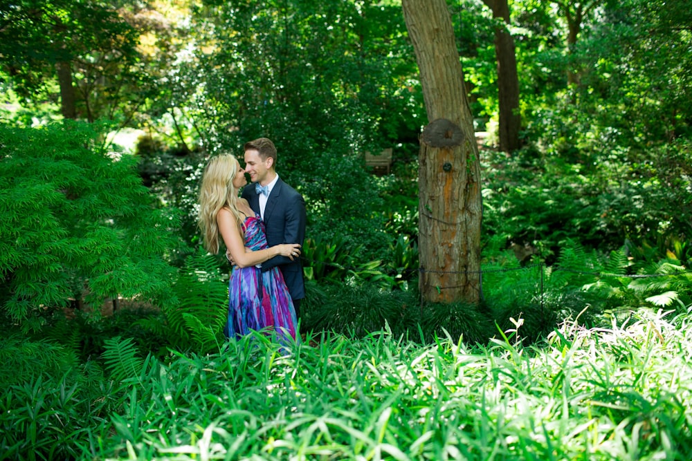 man and woman standing outdoor during daytime