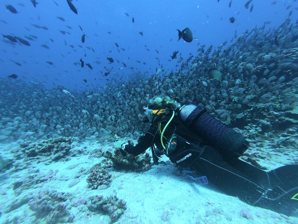 man diving on sea