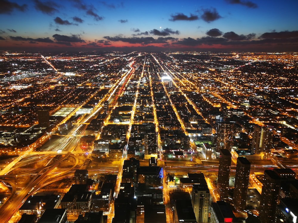 an aerial view of a city at night