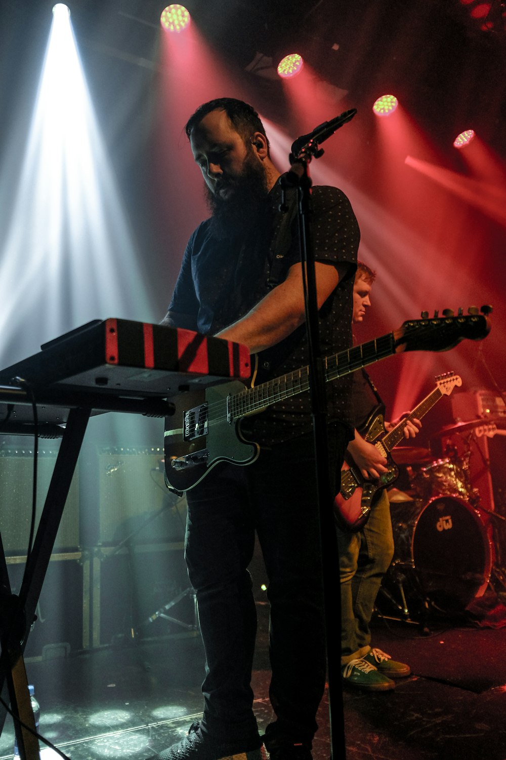 man playing electronic keyboard