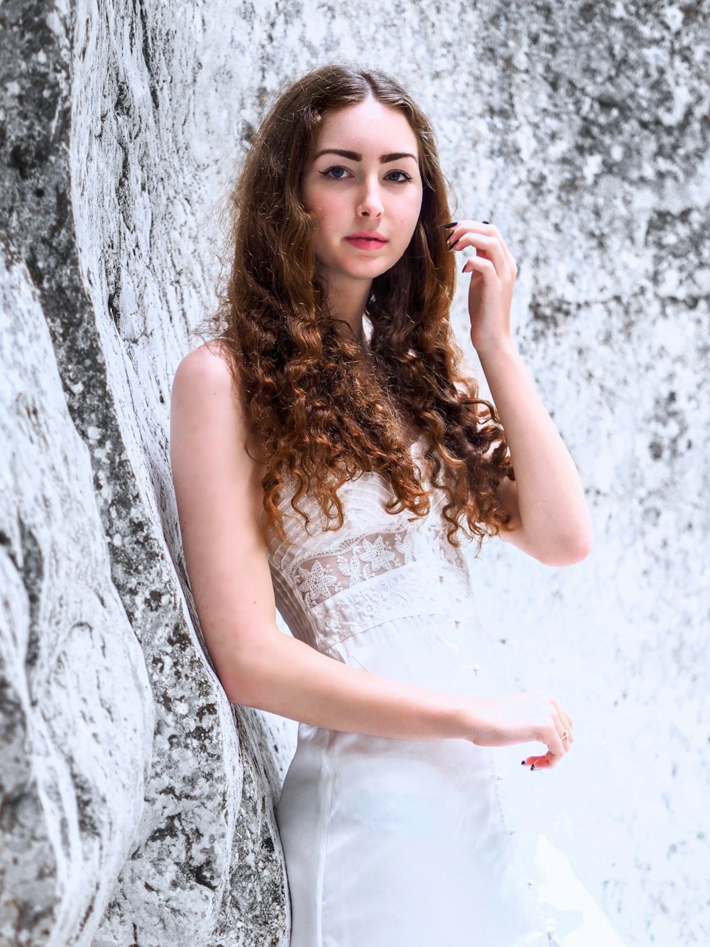 woman in white sleeveless dress