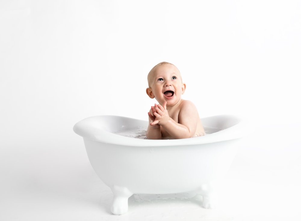 boy in bathtub bathing