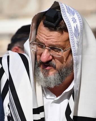 An image depicting tefilin being held by a person.