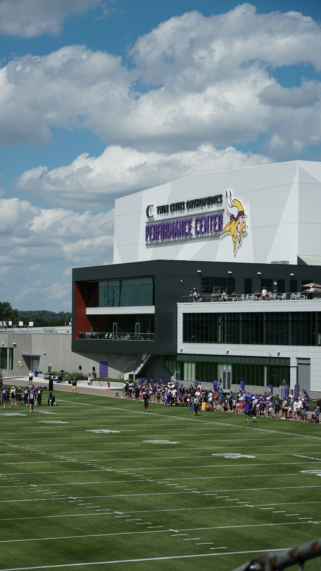 people outside a football field