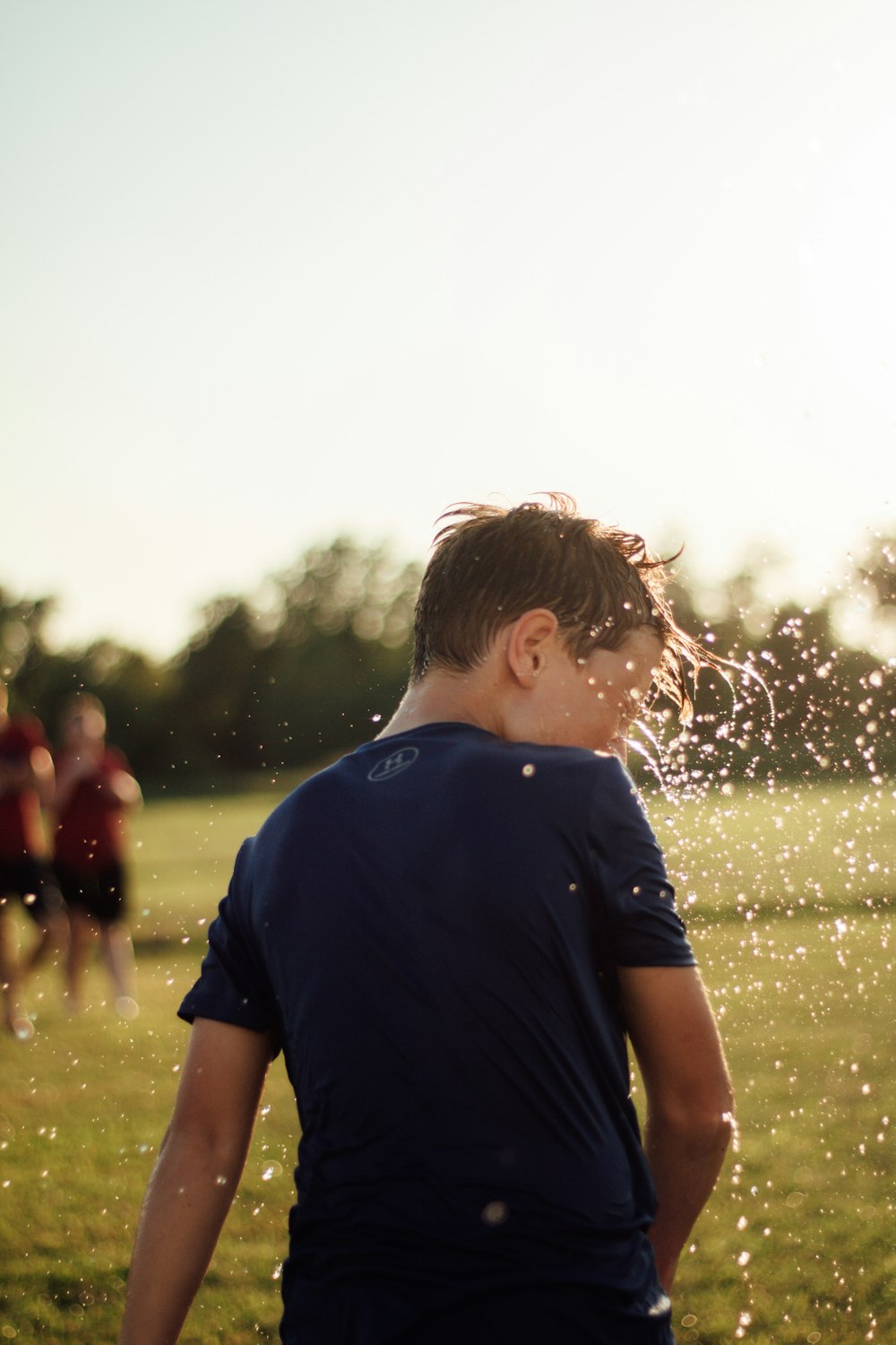 boy in black short-sleeved shirt