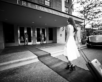 woman pulling luggage