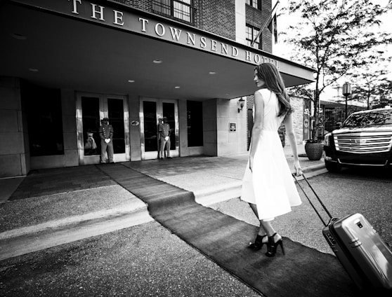 woman pulling luggage