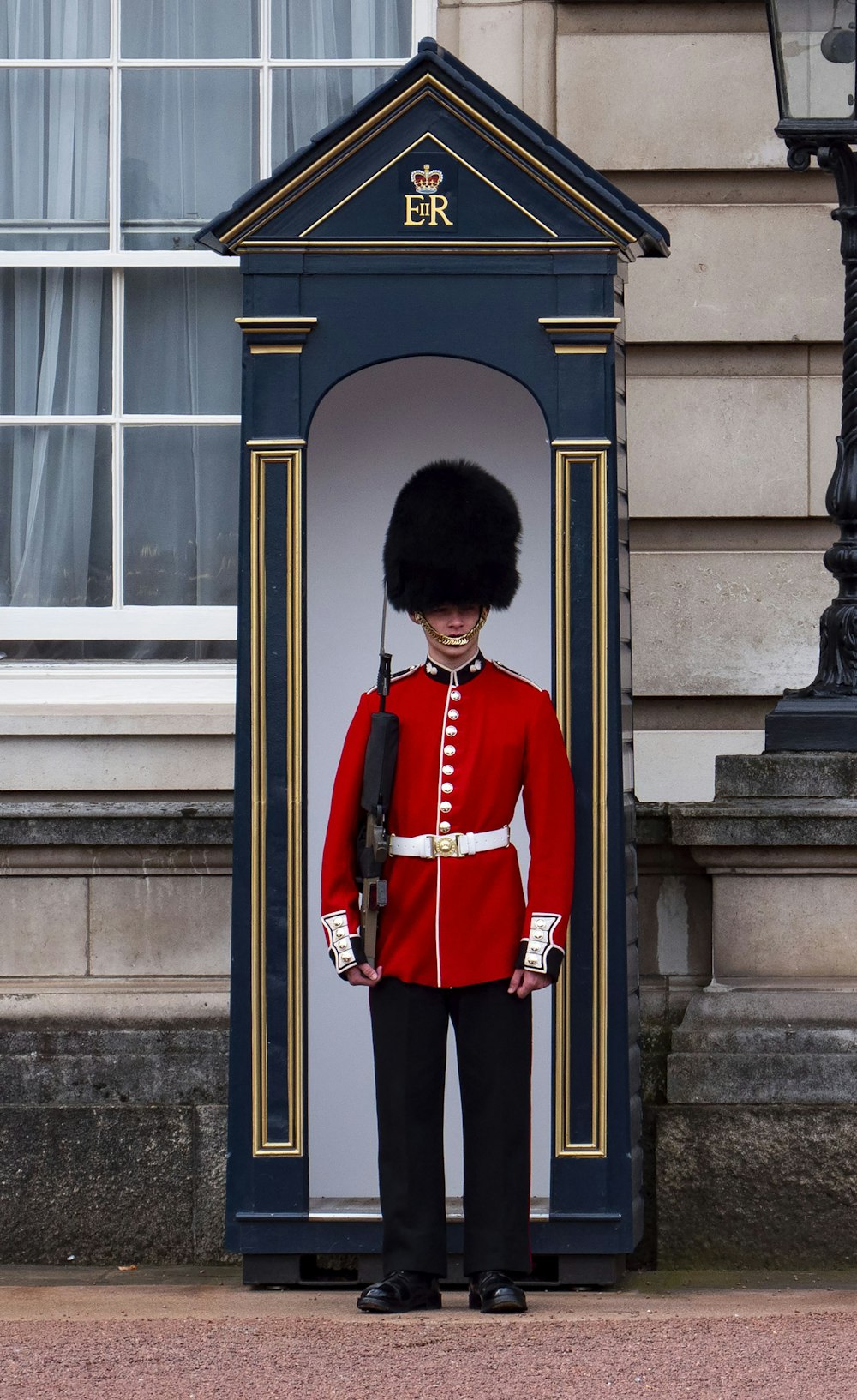 Royal Guard standing near post