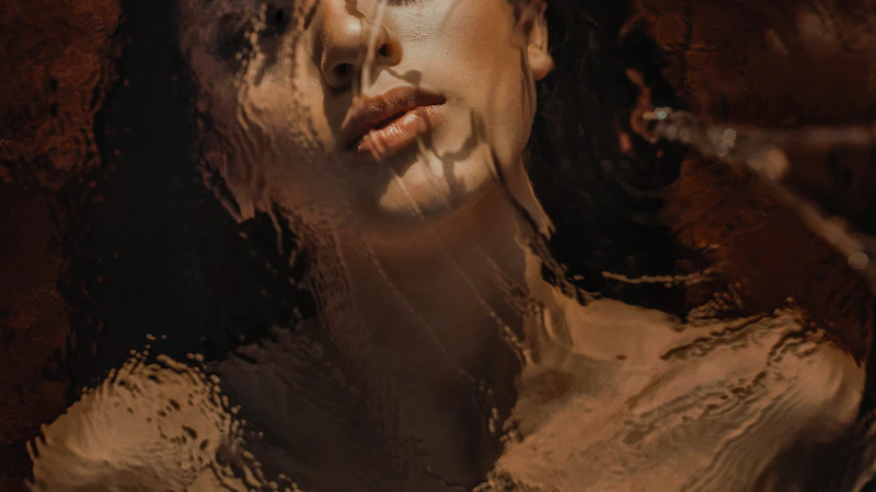 Woman gazing through window