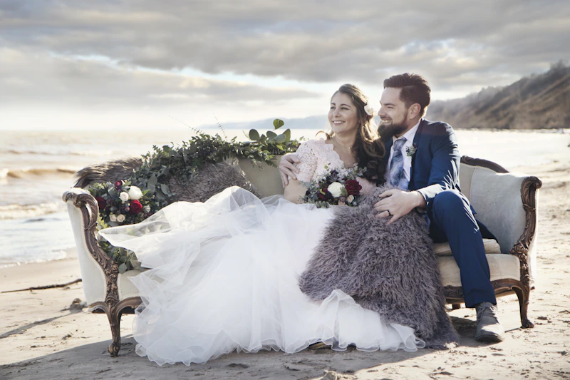 couple relaxing on a seaside sofa
