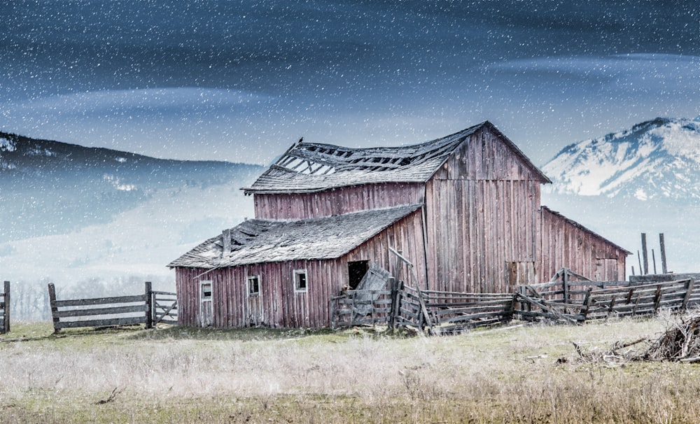 brown barn house under blue sky