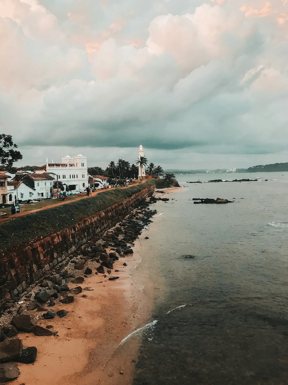 photo of white painted lighthouse